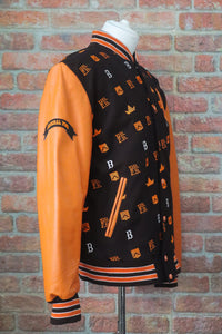 Varsity jacket with brown, orange, and white design on a gray surface | FBB M3 VARSITY One‑of‑One Collector’s Edition