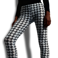 Model wearing FBB Lamb Grey Yoga Leggings with Black Lynx design during yoga session