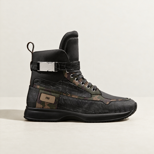 A single high-top sneaker in black textured italian leather and italian suede with camouflage panels, a silver buckle strap, and a tan 'FBB' label on the side, photographed against a light off-white background.