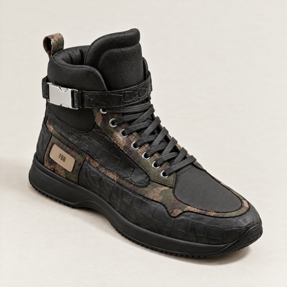 A single high-top sneaker in black textured italian leather and italian suede with camouflage panels, a silver buckle strap, and a tan 'FBB' label on the side, photographed against a light off-white background.