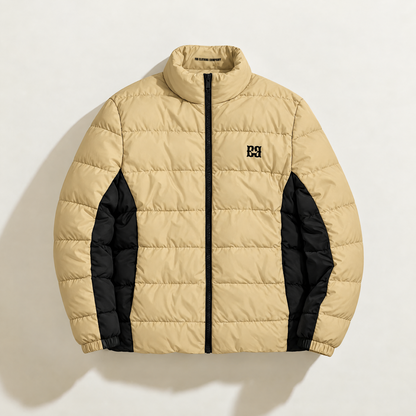 Front view of the beige FBB puffer jacket with black side panels, a black zipper and chest monogram.