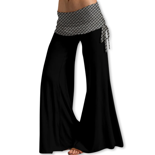 Black & White wide-leg pants with white FBB Lynx pattern.