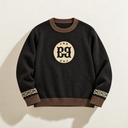 FBB Coco Cream knit sweater with brown ribbed trim, a cream circular chest logo and cream sleeve motifs.



