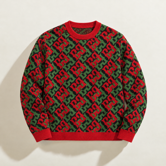 A crewneck sweater featuring a repeating interlocking red and green pattern, with solid red ribbed collar, cuffs, and hem, laid flat against a light beige background.