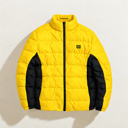 Front view of the yellow FBB puffer jacket with black side panels, a black zipper and chest monogram.
